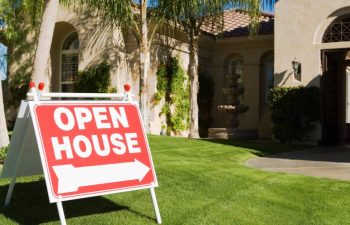 Open house sign in front of home for sale